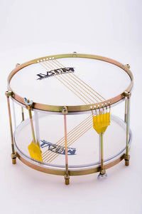 Caixa vazada made by IVSOM. A drum without a shell and two sets of caixa wires, one on each head. 