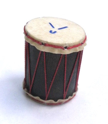 Tiny hand made Brazilian shaker with goat skin heads and red strings.