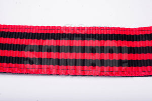 Black and red shoulder strap for samba caixa.